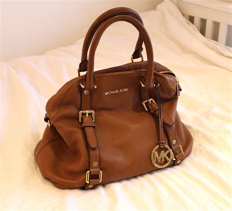 michael kors bag ebay used|Michael Kors handbags older models.